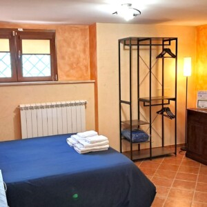 Alloggio Gladiolo - Letto e TV 05